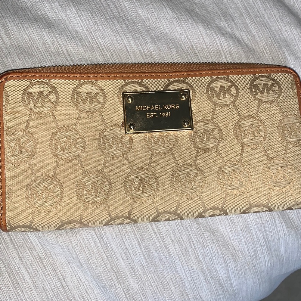 Gold and tan Michael Kor’s wallet